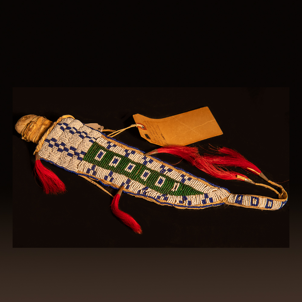 Northern Plains Buffalo Hump knife in beaded and parfleche sheath Sioux Buffalo hump knife